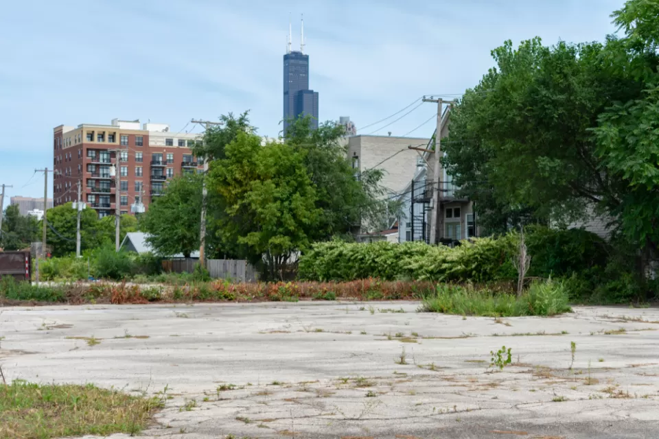Vacant lot in Chicago, Illinois with skyline in background
